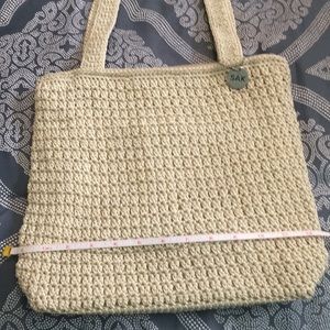 Good Condition Cream colored SAK purse